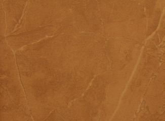 Brown-yellow patterns of porcelain tile or marble.