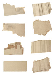 Set of torn cardboard pieces on white background