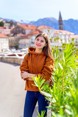 Fototapeta premium Coronavirus is over and borders are open. Now you can travel. Woman have vacation on europen resort.