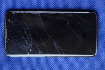 Phone with a broken touch screen. Smart background.