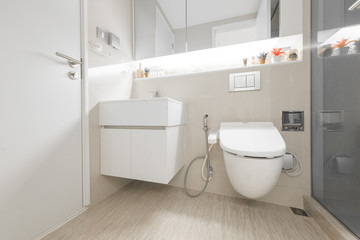 white toilet clean and simple bathroom