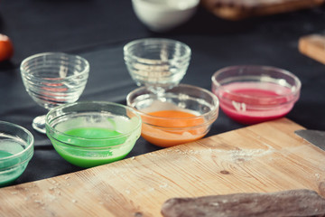 The dough for cupcakes painted in different colors