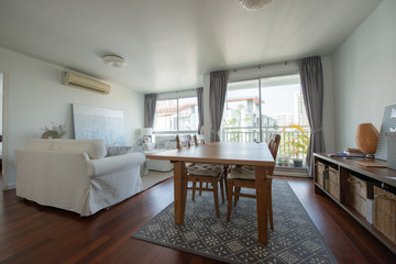 Stylish kitchen interior with dining table and chairs
