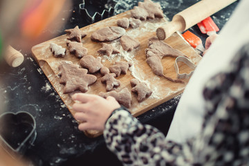 Close up of cookies baking. Little kids hands