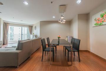 Stylish kitchen interior with dining table and chairs