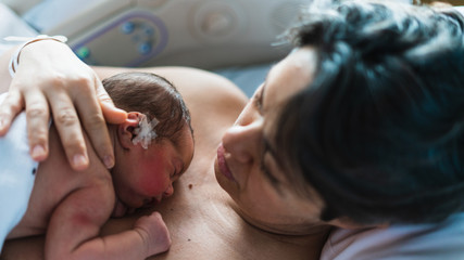 newborn mother and son - obrazy, fototapety, plakaty
