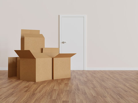 Group of cardboard moving boxes in indoor floor and door in the background