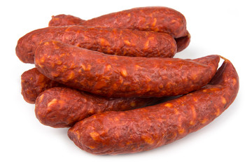 Home made smoked sausages on a white