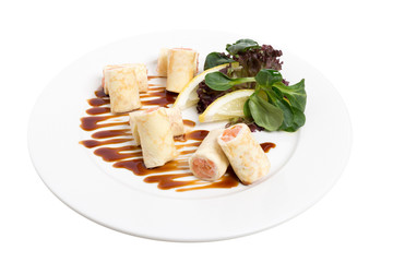 Delicious pancake roll with salmon and cheese.