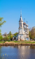 White stone ancient Orthodox church on  banks of  river