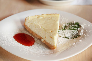 Tasty, bright sweets on a wooden table. Copy space - cafe concept, dessert, food order, beautiful background