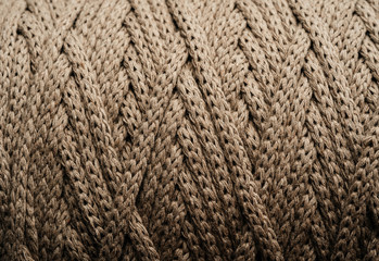 The texture of the rope brown in a skein. Abstract background.