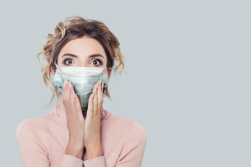 Shocked woman in protective face mask