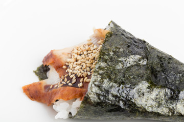 Temaki with smoked eel and soy sauce.
