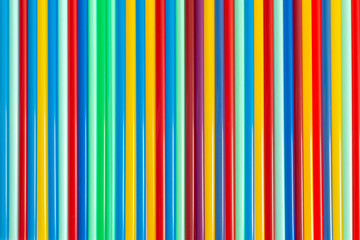 Colorful background of straws for drinks and cocktail