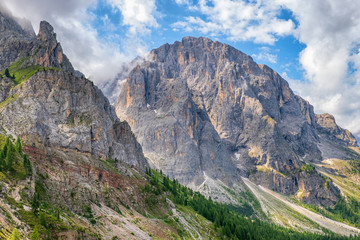 Beautiful mountain view in the dolomites with a hiking trail on the mountainside