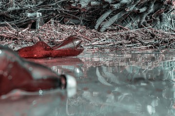 Ecology water. Trash plastic rubbish in ocean, marine beach. Waste garbage in sea and environment. Ecological problem with Empty used dirty plastic bottles.