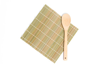 bamboo mat  and wooden ladle isolated on white background.bamboo mat isolated.