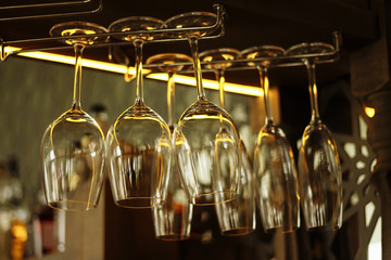 empty clean glasses on a bar counter in a cafe, pandemic, isolation, quarantine