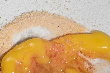 Dirty nasty mixture of powder and yellow and orange cream