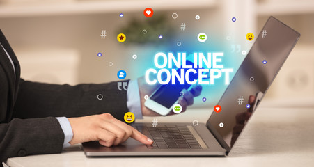 Freelance woman using laptop with ONLINE CONCEPT inscription, Social media concept