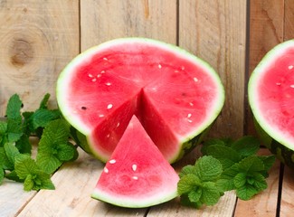 fresh watermelon on wooden table