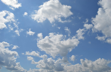 natural background blue sky with white clouds in clear weather on a summer day