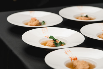 Hungarian traditional cuisine, dumplings with rabbit sauce