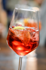 Glass of spritz cocktail close up - Spritz is a wine-based cocktail served as an aperitif in Italy.