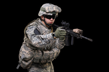 Male in US Army uniform soldier (Flag of the USA on the shoulder). Shot in studio. Isolated with clipping path on black background