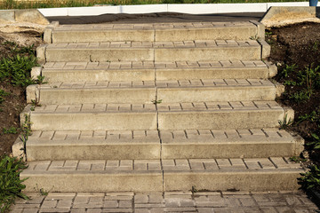 Seven steps. Steps made of slabs. Concrete stairs in the Park.