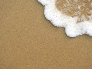 soft wave of the sea on sand beach