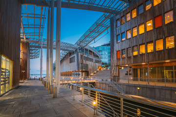 Oslo, Norway. Astrup Fearnley Museum of Modern Art, Residential Multi-storey Houses In Aker Brygge District In Summer Evening. Famous And Popular Place - obrazy, fototapety, plakaty
