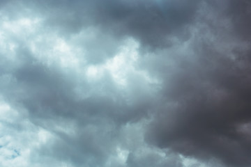 Fototapeta premium Fluffy clouds cover the summer blue sky