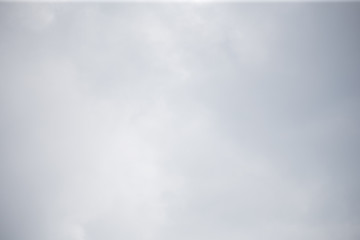 Obraz premium Fluffy clouds cover the summer blue sky