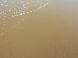 soft wave of the sea on sand beach