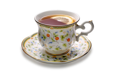 Cup of tea with lemon isolated on white background