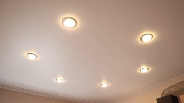 Stretch ceiling. Light on the stretch ceiling. Turn on and off the light