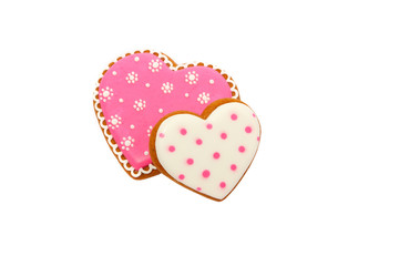 background from pink cookies heart shaped with different patterns, isolated