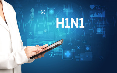 young doctor writing down notes with H1N1 inscription, healthcare concept