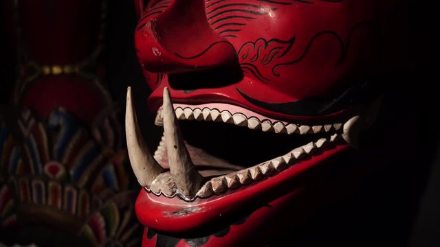 red javanese demon mask in indonesia