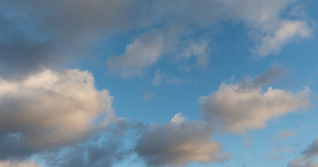 Naklejka na ściany i meble Time lapse of flying clouds nature background no birds, no flicker
