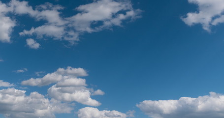 Naklejka na ściany i meble Time lapse of flying clouds nature background no birds, no flicker