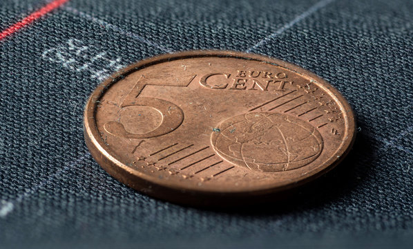 Dirty five euro cent coin in a extreme close up picture