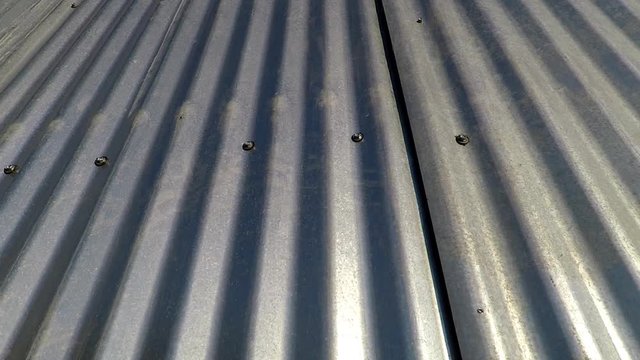 background texture from sheets of galvanized unpainted wave metal