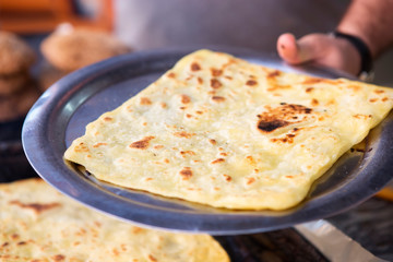 Preparation of Moroccan msemen pancakes
