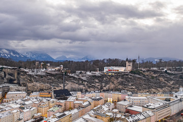 Feb 5, 2020 - Salzburg, Austria: Aerial view of Museum of Modern Art Salzburg on the hill of Monchsberg at dusk