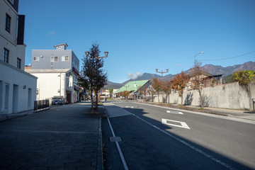 Beautiful scene of empty road in midtown of Nikko with  clear blue sky for background , copy space