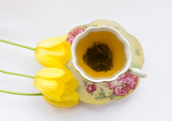 tea Cup with flowers on a white background