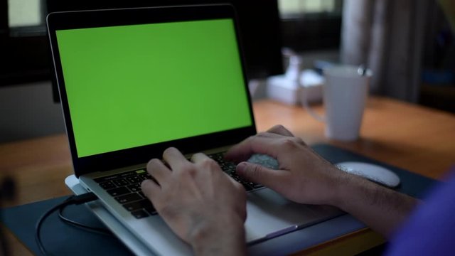 Business man work from home, working with laptop on the table